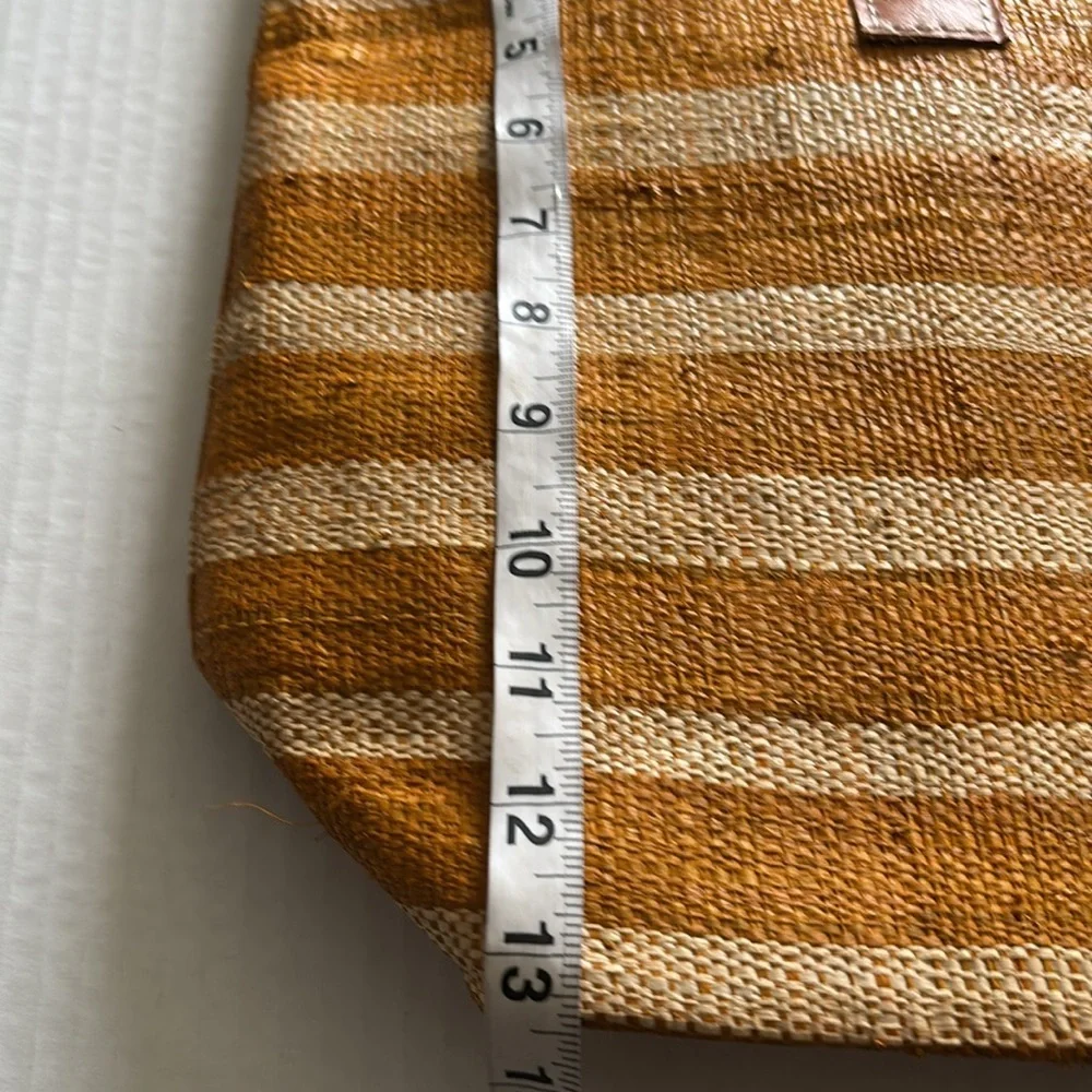 Striped Cream and Golden Orange Women's Woven Straw Bag with Tassel Design